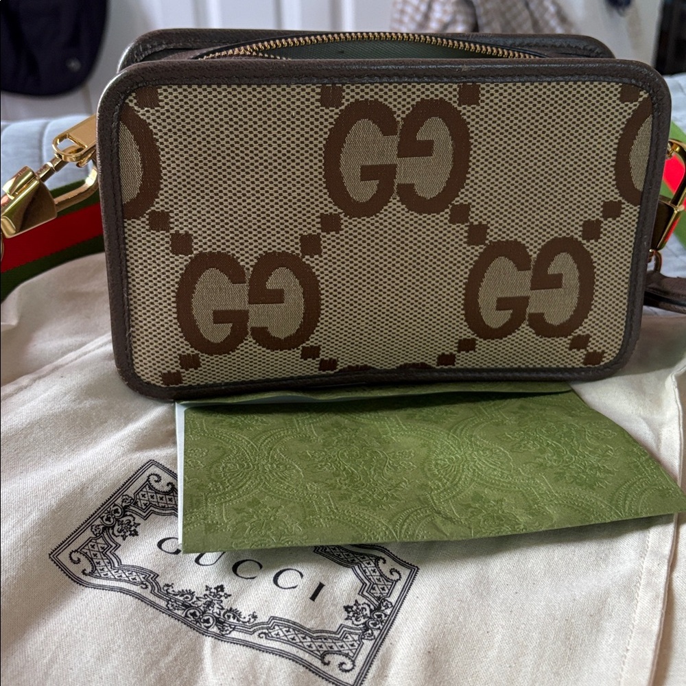 Gucci Tan and Brown GG Canvas Shoulder bag/ crossbody due to adjustable strap.